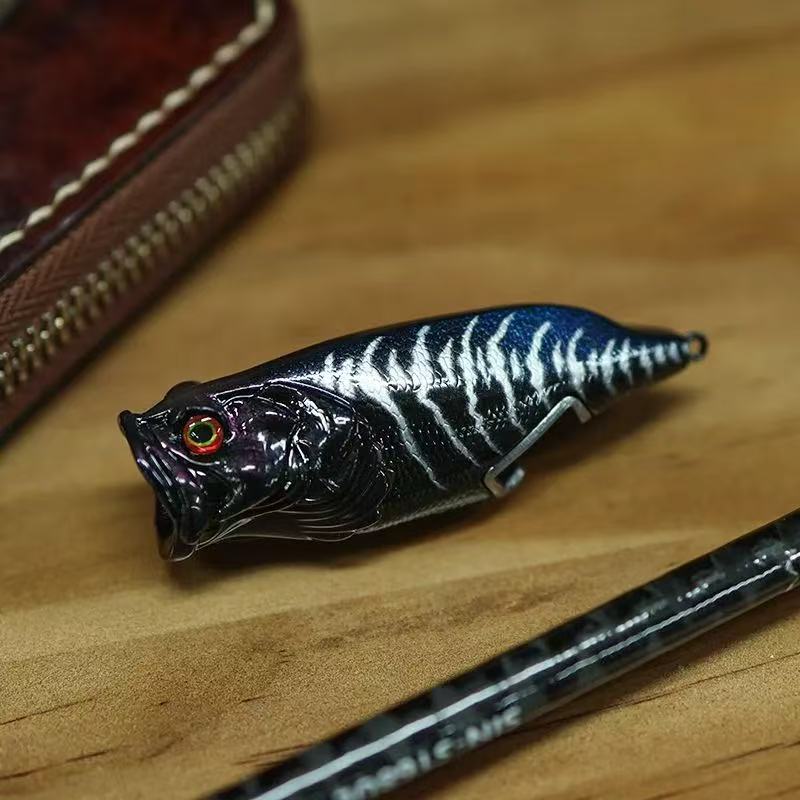 Lure bottle opener, magnetic portable beer bottle opener, bottle opener, artificial lure, refrigerator magnet, ornament.